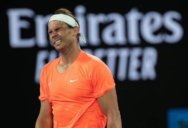 (210217) -- MELBOURNE, Feb. 17, 2021 -- Rafael Nadal reacts during the men s singles quarterfinal match between Rafael Nadal of Spain and Stefanos Tsitsipas of Greece at Australian Open in Melbourne Park, in Melbourne, Australia, on Feb. 17, 2021. (Photo by Xinhua) (SP)AUSTRALIA-MELBOURNE-TENNIS-AUSTRALIAN OPEN-DAY 10 HuxJingchen 