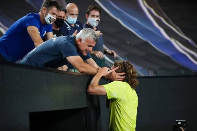 (210217) -- MELBOURNE, Feb. 17, 2021 -- Stefanos Tsitsipas (R) celebrates with his father Apostolos after winning the men s singles quarterfinal match between Rafael Nadal of Spain and Stefanos Tsitsipas of Greece at Australian Open in Melbourne Park, in Melbourne, Australia, on Feb. 17, 2021. ) (SP)AUSTRALIA-MELBOURNE-TENNIS-AUSTRALIAN OPEN-DAY 10 BaixXuefei 