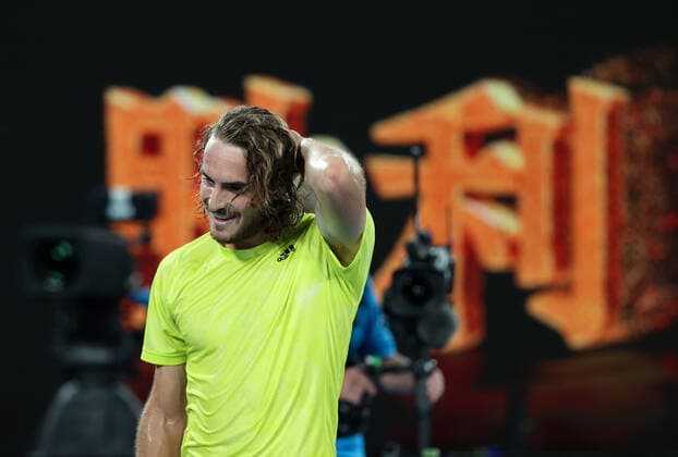 (210217) -- MELBOURNE, Feb. 17, 2021 -- Stefanos Tsitsipas celebrates after winning the men s singles quarterfinal match between Rafael Nadal of Spain and Stefanos Tsitsipas of Greece at Australian Open in Melbourne Park, in Melbourne, Australia, on Feb. 17, 2021. ) (SP)AUSTRALIA-MELBOURNE-TENNIS-AUSTRALIAN OPEN-DAY 10 BaixXuefei 