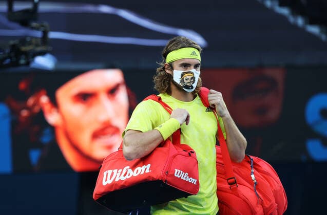 (210217) -- MELBOURNE, Feb. 17, 2021 -- Stefanos Tsitsipas walks onto the court before the men s singles quarterfinal match between Rafael Nadal of Spain and Stefanos Tsitsipas of Greece at Australian Open in Melbourne Park, in Melbourne, Australia, on Feb. 17, 2021. ) (SP)AUSTRALIA-MELBOURNE-TENNIS-AUSTRALIAN OPEN-DAY 10 BaixXuefei 