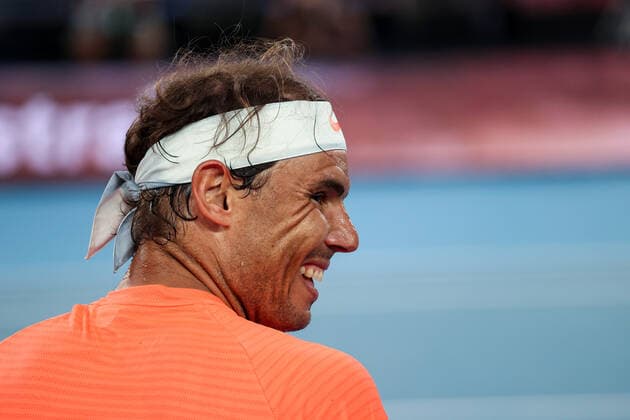 (210217) -- MELBOURNE, Feb. 17, 2021 -- Rafael Nadal reacts during the men s singles quarterfinal match between Rafael Nadal of Spain and Stefanos Tsitsipas of Greece at Australian Open in Melbourne Park, in Melbourne, Australia, on Feb. 17, 2021. ) (SP)AUSTRALIA-MELBOURNE-TENNIS-AUSTRALIAN OPEN-DAY 10 BaixXuefei 