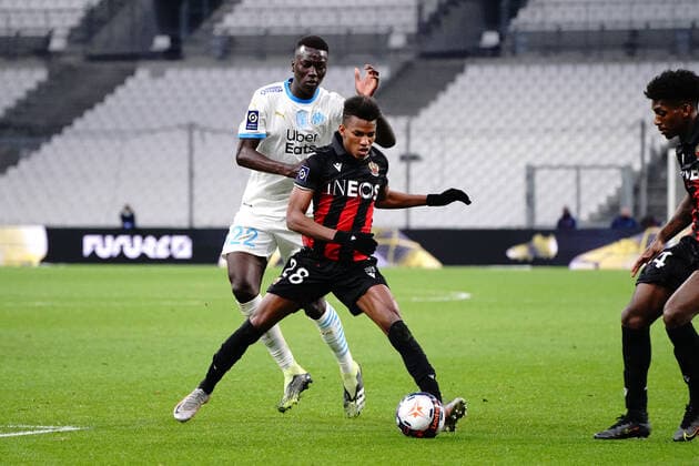 Hicham Boudaoui (OGC Nice) - Pape Gueye (Olympique de Marseille) FOOTBALL : Olympique de Marseille vs OGC Nice - Ligue 1 Uber Eats - Marseille - 17 02 2021 NorbertScanella PanoramiC 