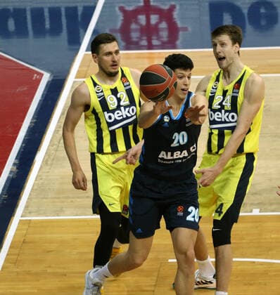Edgar Ulanovas (L) , Jan Vesely (R) of Fenerbahce and Simone Fontecchio (C) of Alba Berlin during the Turkish Airlines Euroleague basketball match between Fenerbahce Beko and Alba Berlin at Ulker arena in Istanbul , Turkey on February 19 , 2021. 