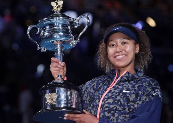 (210220) -- MELBOURNE, Feb. 20, 2021 -- Osaka Naomi of Japan celebrates with her trophy during the awarding ceremony after women s singles final between Osaka Naomi of Japan and Jennifer Brady of the United States at Australian Open in Melbourne, Australia, Feb. 20, 2021. ) (SP)AUSTRALIA-MELBOURNE-TENNIS-AUSTRALIAN OPEN-DAY 13 BaixXuefei 
