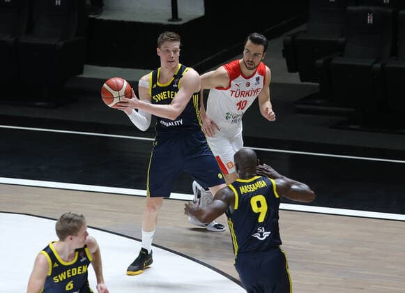 Melih Mahmutoglu (10) of Turkey and Jonas Christopher Jerebko of Sweden FIBA Eurobasket Qualifiers Group D match between Turkey and Sweden at Besiktas Akatlar Arena in Istanbul , Turkey on February 20 , 2021. 