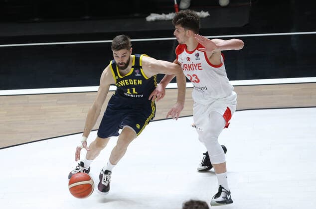 Alperen Sengun of Turkey and William Magarity (11) of Sweden FIBA Eurobasket Qualifiers Group D match between Turkey and Sweden at Besiktas Akatlar Arena in Istanbul , Turkey on February 20 , 2021. 