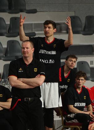 20.02.2021 Podgorica(Montenegro) Germany-Great Britain Eurobasket qualifiers men s basketball Andreas Seiferth(C) Germany react during lost match between Henrik Rödl Roedl(L) Germany head coach and Bennet Hundt(R) :Str