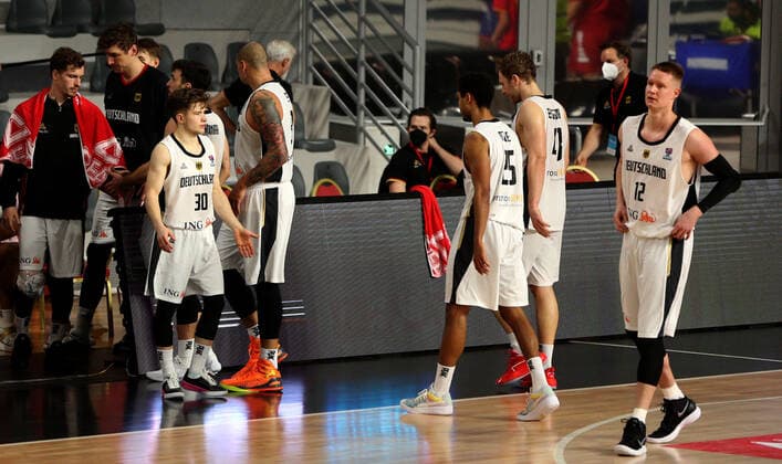 20.02.2021 Podgorica(Montenegro) Germany-Great Britain Eurobasket qualifiers men s basketball Andreas Obst(L),Andreas Seiferth(2L),Bennet Hundt(3L),Robin Benzing(R) Germany after lost match :Str