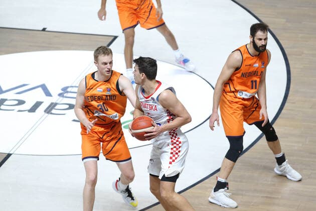 Basketball, EM Quali, Kroatien - Niederlande Filip Kruslin (5) of Croatia and Olaf Schaftenaar (30) , Shane Hammink (11) of Netherlands during the FIBA Eurobasket Qualifiers Group D match between Croatia and Netherlands at Besiktas Akatlar Arena in Istanbul , Turkey on February 20 , 2021. 