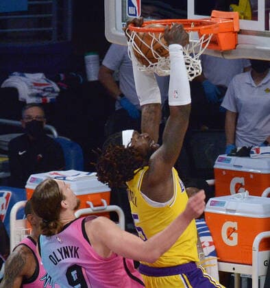 Los Angeles Lakers center Montreal Harrell scores on Miami Heat center Kelly Olynyk during the second half at Staples Center in Los Angeles on Saturday, February 20, 2021. The Heat defeated the Lakers 96-94.  LAP2021022009 JIMxRUYMEN