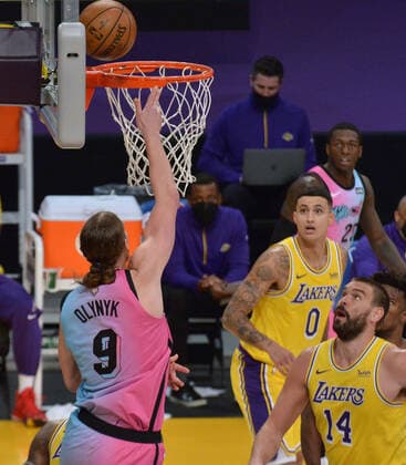 Miami Heat center Kelly Olynyk scores on Los Angeles Lakers center Marc Gasol during the second half at Staples Center in Los Angeles on Saturday, February 20, 2021. The Heat defeated the Lakers 96-94.  LAP2021022017 JIMxRUYMEN