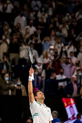 MELBOURNE, VIC - FEBRUARY 21: Novak Djokovic of Serbia celebrates after winning his match during the Men s Singles Final of the 2021 Australian Open on February 21 2021, at Melbourne Park in Melbourne, Australia. (Photo by Jason Heidrich Icon Sportswire) TENNIS: FEB 21 Australian Open Icon21022100614