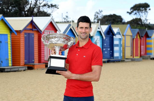 TENNIS AUSTRALIAN OPEN, Novak Djokovic of Serbia poses for photographs on Brighton Beach with the Norman Brookes Challenge Cup following his Men s singles finals win against Daniil Medvedev of Russia at the Australian Open in Melbourne, Monday, February 22, 2021. ( NO ARCHIVING, EDITORIAL USE ONLY, NO USE IN BOOKS WITHOUT CONSENT MELBOURNE VIC AUSTRALIA  Copyright: xDAVExHUNTx 20210222001522310225