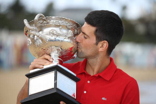 Novak Djokovic, SRB, presenting his trophy after 2021 Australian Open final in Melbourne on Brighton beach, 22 02 2021