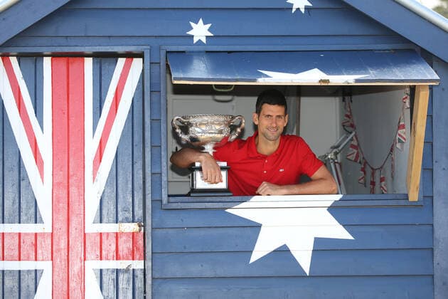Novak Djokovic, SRB, presenting his trophy after 2021 Australian Open final in Melbourne on Brighton beach, 22 02 2021