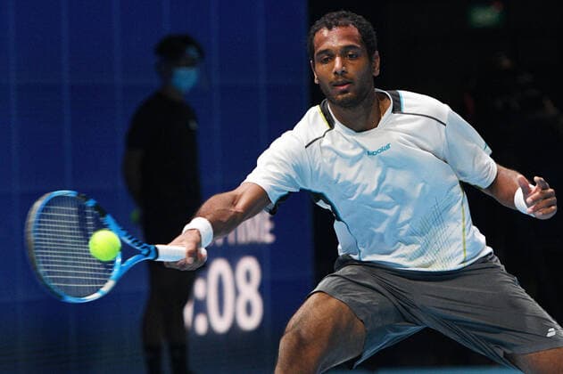 (210222) -- SINGAPORE, Feb. 22, 2021 -- India s Ramkumar Ramanathan returns a ball during the men s singles first round match between Japan s Daniel Taro and India s Ramkumar Ramanathan at the Singapore Tennis Open in Singapore, Feb. 22, 2021. (Photo by Xinhua) (SP)SINGAPORE-TENNIS-SINGAPORE OPEN-MEN S SINGLES ThenxChihxWey 