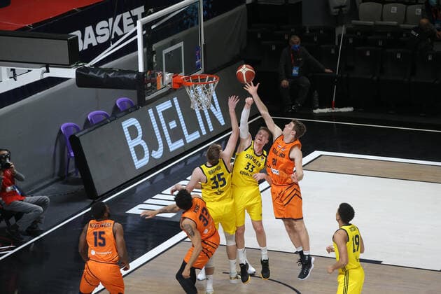 Luuk van Bree (20) of Netherlands and Jonas Jerebko (33) , Simon Birgander (35) of Sweden during the FIBA Eurobasket Qualifiers Group D match between Netherlands and Sweden at Besiktas Akatlar Arena in Istanbul , Turkey on February 22 , 2021. 