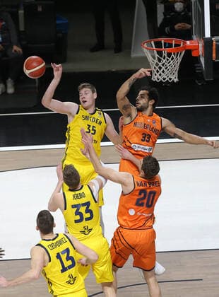 Luuk van Bree (20) , Jito Kok (33) of Netherlands and Simon Birgander (35) , Jonas Jerebko (33) of Sweden during the FIBA Eurobasket Qualifiers Group D match between Netherlands and Sweden at Besiktas Akatlar Arena in Istanbul , Turkey on February 22 , 2021. 