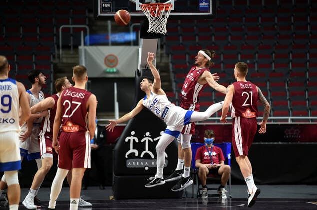 (210223) -- RIGA, Feb. 23, 2021 -- Players compete during the FIBA EuroBasket 2022 qualifying basketball match between Latvia and Greece in Riga, Latvia, Feb. 22, 2021. (Photo by Xinhua) (SP)LATVIA-RIGA-BASKETBALL-FIBA EUROBASKET 2022 QUALIFIERS-LATVIA VS GREECE EdijsxPalens 