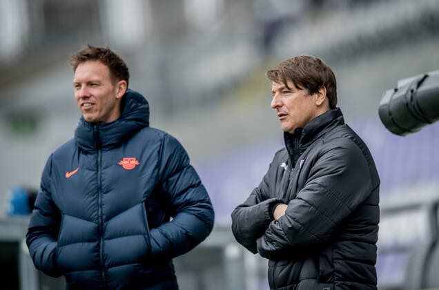 Leipzigs coach Julian Nagelsmann and coach Michael Oenning of Ujpest Budapest during RB Leipzigs warm-up before the Champions League match against Liverpool FC 16 02 2021, Szusza Ferenc Stadium in Budapest Hungary Training CL RB Leipzig