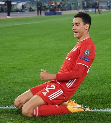 Sport Bilder des Tages (210224) -- ROME, Feb. 24, 2021 -- Bayern Munich s Jamal Musiala celebrates during a UEFA Champions League round of 16 first leg football match between Lazio and Bayern Munich in Rome, Italy, Feb. 23, 2021. (Photo by Xinhua) (SP)ITALY-ROME-FOOTBALL-UEFA CHAMPIONS LEAGUE-LAZIO VS BAYERN MUNICH AugustoxCasasoli 