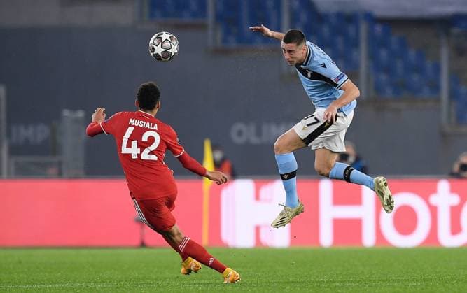 FOOTBALL CHAMPIONS LEAGUE SEASON 2020 2021 Round of 16 First leg 23 02 2021 Lazio Roma FC Bayern Muenchen Jamal Musiala left, FC Bayern Muenchen vs Adam Marusic left, Lazio Roma