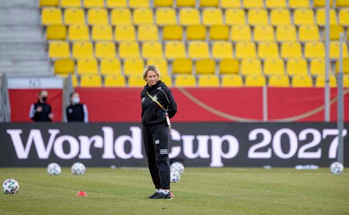 National coach coach Martina VOSS TECKLENBURG GER behind it writing the World Cup 2027 on a band, application, logo, football Laenderspiel women, mini-tournament Three Nations One Goal, Germany GER Belgium BEL 2 0, on 21 02 2021 in Aachen Germany Â