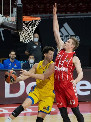 Tel Avivs 4 CALOIARO vs Bayerns 43 Leon RADOSEVIC basketball, FC Bayern Tel Aviv, Euroleague, 2020 2021 season, on 25 2 2021 in Munich, A U D I D O M E, Germany source copyright credit Oryk HAIST x1DX34580x