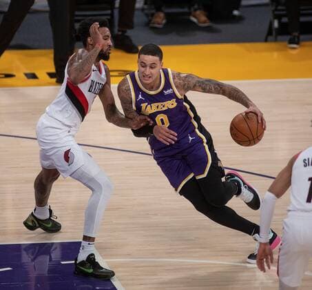 Kyle Kuzma 0 of the Los Angeles Lakers drives to the basket against Derrick Jones Jr. 55 of the Portland Trailblazers during their regular season NBA, Basketball Herren, USA game with the Portland Trailblazers at the Staples Center in Los Angeles, California, USA, Friday February 26, 2021. Lakers vs Trailblazers !ACHTUNG: NUR REDAKTIONELLE NUTZUNG!  Copyright: xJAVIERxROJASx AME8491 20210227-637500049459550434