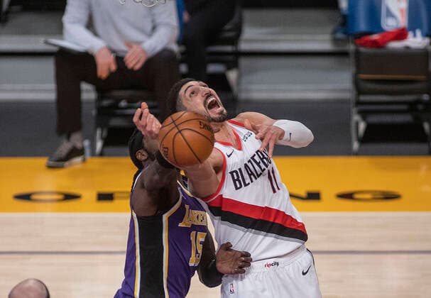February 26, 2021, Los Angeles, California, USA: Enes Kanter 11 of the Portland Trailblazers is fouled by Montrezl Harrell 15 of the Los Angeles Lakers during their regular season NBA, Basketball Herren, USA game on Friday February 26, 2021 at the Staples Center in Los Angeles, California. Lakers defeat Trailblazers, 102-93. PI Los Angeles USA - ZUMAp124 20210226_zaa_p124_021 Copyright: xJAVIERxROJASx