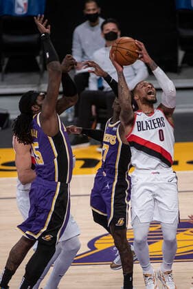 February 26, 2021, Los Angeles, California, USA: Damian Lillard 0 of the Portland Trailblazers puts up a shot during their regular season NBA, Basketball Herren, USA game with the Los Angeles Lakers on Friday February 26, 2021 at the Staples Center in Los Angeles, California. Lakers defeat Trailblazers, 102-93. PI Los Angeles USA - ZUMAp124 20210226_zaa_p124_022 Copyright: xJAVIERxROJASx
