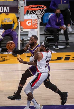 February 26, 2021, Los Angeles, California, USA: LeBron James 23 of the Los Angeles Lakers is fouled by Robert Covington 23 of the Portland Trailblazers during their regular season NBA, Basketball Herren, USA game on Friday February 26, 2021 at the Staples Center in Los Angeles, California. Lakers defeat Trailblazers, 102-93. PI Los Angeles USA - ZUMAp124 20210226_zaa_p124_026 Copyright: xJAVIERxROJASx