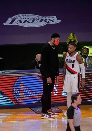 February 26, 2021, Los Angeles, California, USA: Anthony Davis 3 of the Los Angeles Lakers chats with Damian Lillard 0 of the Portland Trailblazers during their regular season NBA, Basketball Herren, USA game on Friday February 26, 2021 at the Staples Center in Los Angeles, California. Lakers defeat Trailblazers, 102-93. PI Los Angeles USA - ZUMAp124 20210226_zaa_p124_033 Copyright: xJAVIERxROJASx