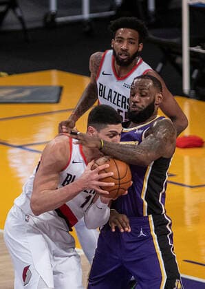 February 26, 2021, Los Angeles, California, USA: LeBron James 23 of the Los Angeles Lakers blocks a shot by Enes Kanter 11 of the Portland Trailblazers during their regular season NBA, Basketball Herren, USA game on Friday February 26, 2021 at the Staples Center in Los Angeles, California. Lakers defeat Trailblazers, 102-93. PI Los Angeles USA - ZUMAp124 20210226_zaa_p124_034 Copyright: xJAVIERxROJASx