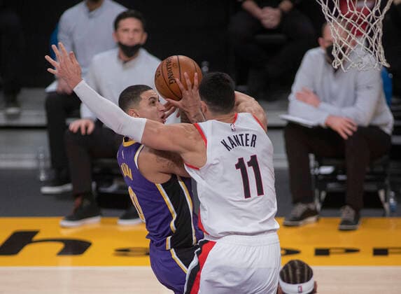 February 26, 2021, Los Angeles, California, USA: Kyle Kuzma 0 of the Los Angeles Lakers is fouled by Enes Kanter 11 of the Portland Trailblazers during their regular season NBA, Basketball Herren, USA game on Friday February 26, 2021 at the Staples Center in Los Angeles, California. Lakers defeat Trailblazers, 102-93. PI Los Angeles USA - ZUMAp124 20210226_zaa_p124_038 Copyright: xJAVIERxROJASx