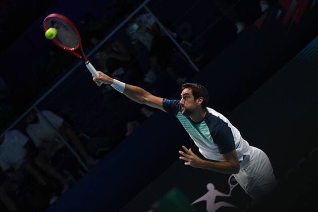 (210227) -- SINGAPORE Feb. 27, 2021 -- Marin Cilic serves during the men s singles semi-final match between Croatia s Marin Cilic and Australia s Alexei Popyrin at the Singapore Tennis Open tournament in Singapore on Feb. 27, 2021. (Photo by Xinhua) (SP)SINGAPORE-TENNIS-SINGAPORE OPEN-MEN S SINGLES ThenxChihxWey 