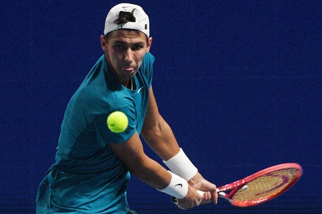 (210227) -- SINGAPORE Feb. 27, 2021 -- Alexei Popyrin hits a return during the men s singles semi-final match between Croatia s Marin Cilic and Australia s Alexei Popyrin at the Singapore Tennis Open tournament in Singapore on Feb. 27, 2021. (Photo by Xinhua) (SP)SINGAPORE-TENNIS-SINGAPORE OPEN-MEN S SINGLES ThenxChihxWey 