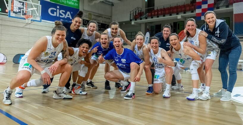Team photo of the GISA Lions after the victory GISA Lions SV Halle vs SNP BasCats USC Heidelberg Basketball 1 Bundesliga ERDGAS Sportarena Halle Saale 27 02 2021 Photo Holger John Sachsen Anhalt Germany ERDGAS Sportarena Halle Saale