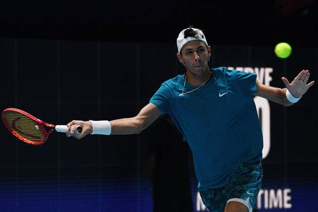 (210228) -- SINGAPORE, Feb. 28, 2021 -- Alexei Popyrin of Australia hits a return during the men s singles final against Alexander Bublik of Kazakhstan at the Singapore Tennis Open tournament in Singapore on Feb. 28, 2021. (Photo by Xinhua) (SP)SINGAPORE-TENNIS-SINGAPORE OPEN-MEN S SINGLES ThenxChihxWey 
