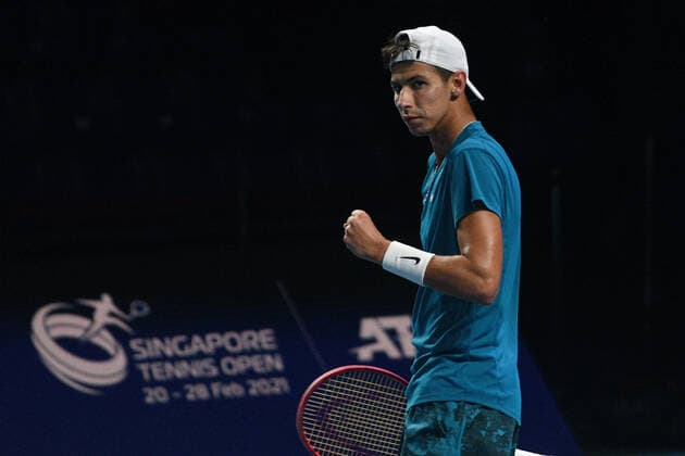 (210228) -- SINGAPORE, Feb. 28, 2021 -- Alexei Popyrin of Australia celebrates during the men s singles final against Alexander Bublik of Kazakhstan at the Singapore Tennis Open tournament in Singapore on Feb. 28, 2021. (Photo by Xinhua) (SP)SINGAPORE-TENNIS-SINGAPORE OPEN-MEN S SINGLES ThenxChihxWey 