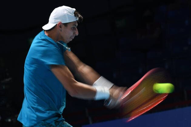 (210228) -- SINGAPORE, Feb. 28, 2021 -- Alexei Popyrin of Australia hits a return during the men s singles final against Alexander Bublik of Kazakhstan at the Singapore Tennis Open tournament in Singapore on Feb. 28, 2021. (Photo by Xinhua) (SP)SINGAPORE-TENNIS-SINGAPORE OPEN-MEN S SINGLES ThenxChihxWey 