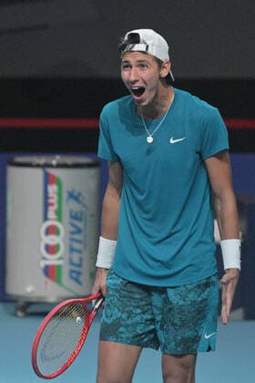 (210228) -- SINGAPORE, Feb. 28, 2021 -- Alexei Popyrin of Australia celebrates after winning the men s singles final against Alexander Bublik of Kazakhstan at the Singapore Tennis Open tournament in Singapore on Feb. 28, 2021. (Photo by Xinhua) (SP)SINGAPORE-TENNIS-SINGAPORE OPEN-MEN S SINGLES ThenxChihxWey 