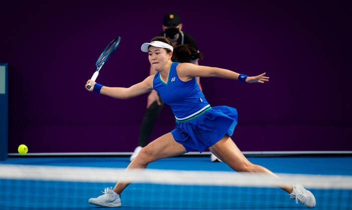 February 28, 2021, DOHA, QATAR: Lin Zhu of China in action during the second qualifications round of the 2021 Qatar Total Open WTA, Tennis Damen 500 tournament against Kristyna Pliskova of the Czech Republic DOHA QATAR - ZUMAa181 20210228_zaa_a181_084 Copyright: xRobxPrangex