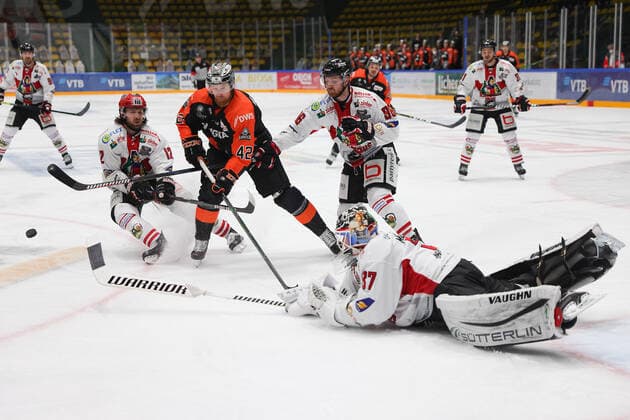 Loewen Frankfurt - EHC Freiburg, DEL 2 Goalkeeper Ben Meisner EHC Freiburg, 37 saves in front of Alexej Dmitriev Loewen Frankfurt, 42 defending Andree Hult EHC Freiburg, 12 and Alexander Brueckmann EHC Freiburg, 86 Ice hockey match of the DEL 2 between the Loewen Frankfurt and the EHC Freiburg on 28 February 2021 in the Eissporthalle Frankfurt am Main , Frankfurt am Main Hessen Germany Eissporthalle