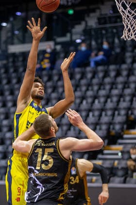 Oldenburg, Lower Saxony, DEU, 28 02 2021, Norris Agbakoko center, EWE Baskets Oldenburg and Martin Peterka basketball Löwen Braunschweig EWE Baskets Oldenburg vs Löwen Baskets Braunschweig 1 Basketball Bundesliga season 2020 2021, 21 matchday, Grosse EWE Arena EWE Baskets Oldenburg vs Löwen Baskets Braunschweig www.andreas-burmann.de