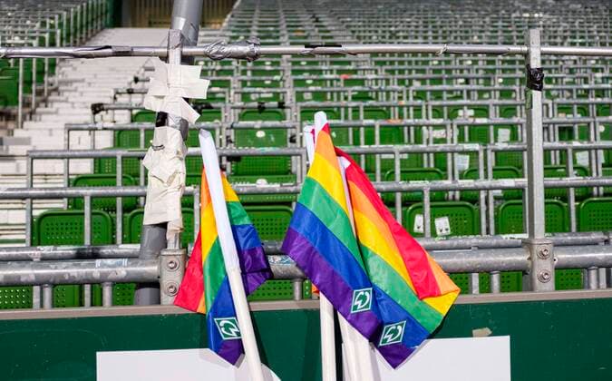 Feature, corner flags in rainbow look stand in front of the grandstand at Wohninvest Weserstadion, corner flag, Football 1 Bundesliga, 23 Spieltag, SV Werder Bremen HB Eintracht Frankfurt F 2 1, on 26 02 2021 in Bremen Germany DFL regulations prohibit any use of photographs as image sequences and or quasi video Â