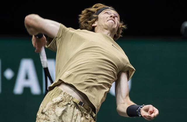 ROTTERDAM Andrey Rublev RUS in action against Marcos Giron USA on the second day of the ABN AMRO World Tennis Tournament in Rotterdam, The Netherlands, 02 March 2021 The ATP tournament in Ahoy takes place without an audience due to the corona pandemic ANP KOEN SUYK xVIxANPxSportx xxANPxIVx 428788572