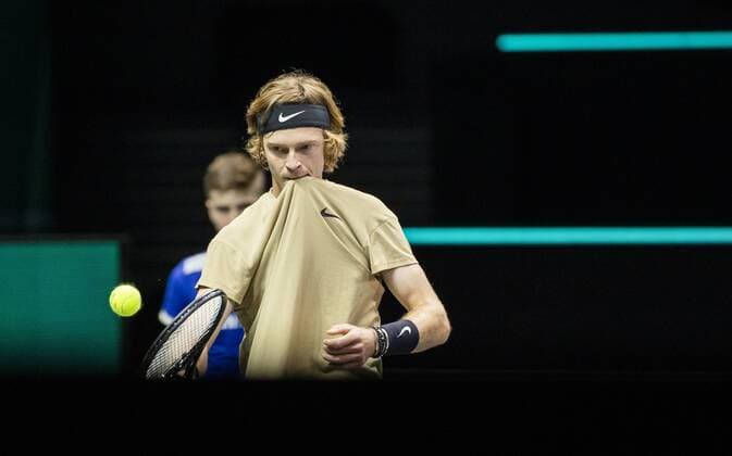 ROTTERDAM Andrey Rublev RUS in action against Marcos Giron USA on the second day of the ABN AMRO World Tennis Tournament The ATP tournament in Ahoy takes place without an audience due to the corona pandemic ANP KOEN SUYK xVIxANPxSportx xxANPxIVx 428789210