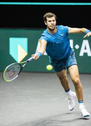 ROTTERDAM Karen Khachanov RUS in action against Stan Wawrinka SUI on the second day of the ABN AMRO World Tennis Tournament in Rotterdam, The Netherlands, 02 March 2021 The ATP tournament in Ahoy takes place without an audience due to the corona pandemic ANP KOEN SUYK xVIxANPxSportx xxANPxIVx 428790729