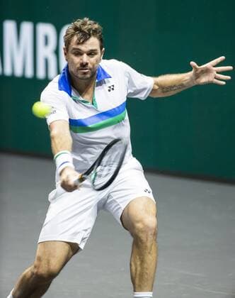ROTTERDAM Stan Wawrinka SUI in action against Karen Khachanov RUS on the second day of the ABN AMRO World Tennis Tournament The ATP tournament in Ahoy takes place without an audience due to the corona pandemic ANP KOEN SUYK xVIxANPxSportx xxANPxIVx 428791871